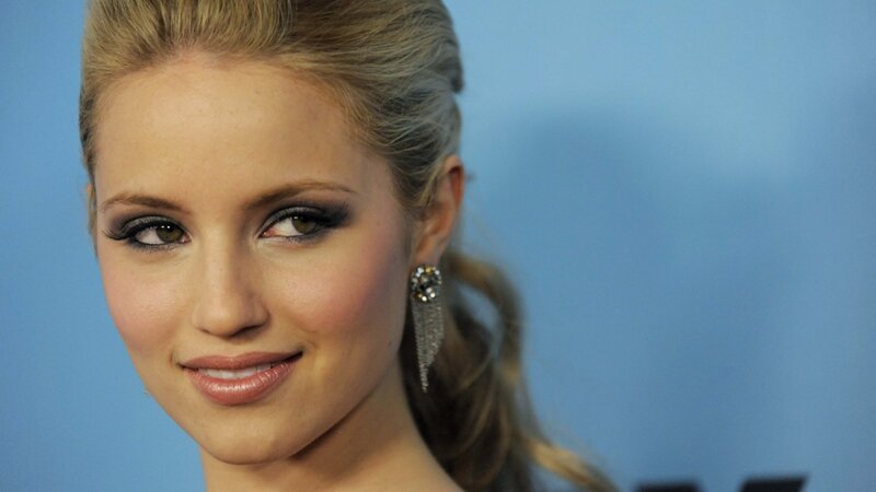 woman with makeup and earrings