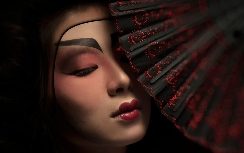 Woman with Makeup and Fan