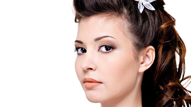 woman with makeup and hair accessory