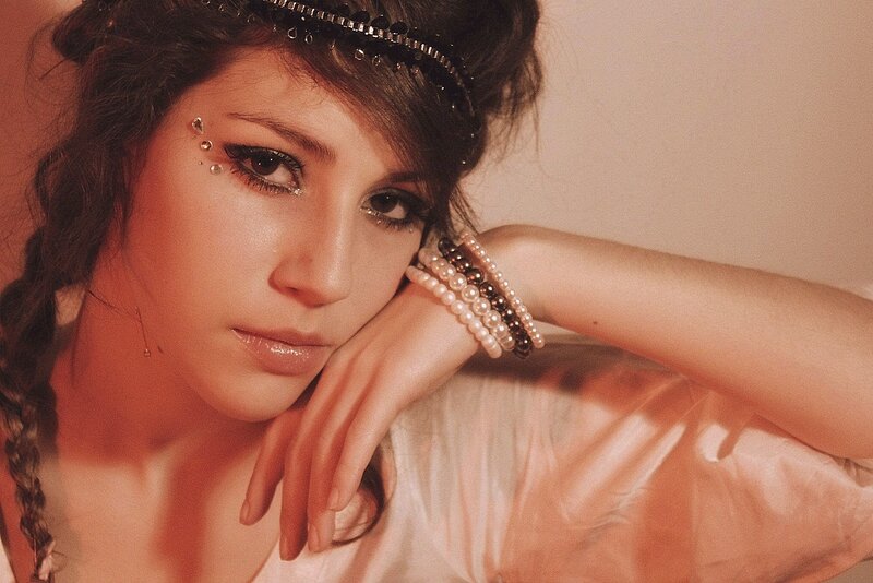 woman with makeup and headband