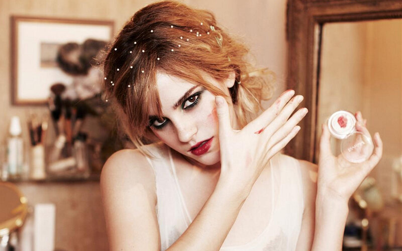 woman with makeup and red stains