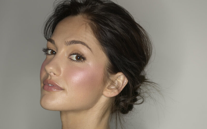 woman with makeup and styled hair