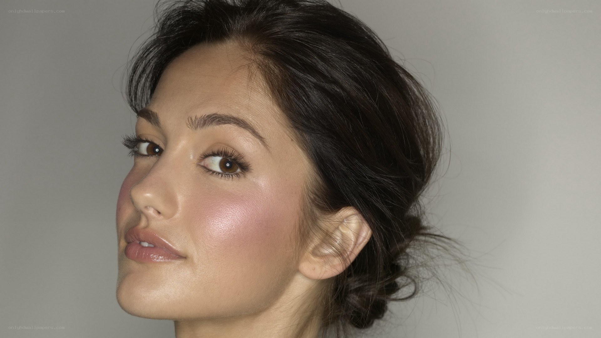 woman with makeup and updo