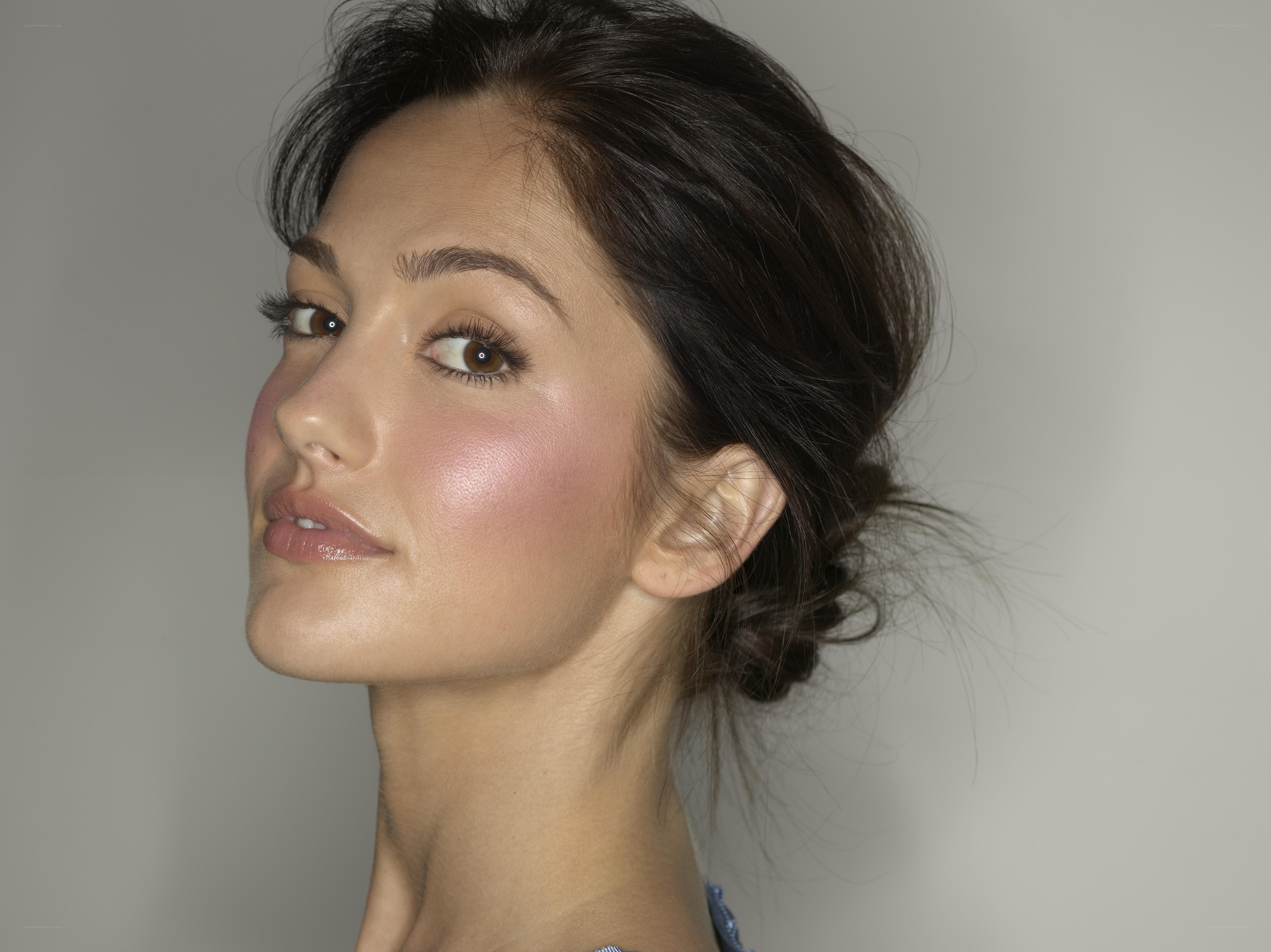 woman with makeup and updo