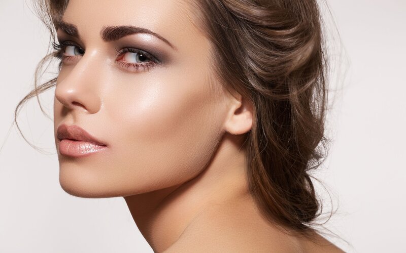 woman with makeup in profile