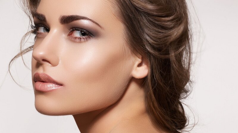 woman with makeup in profile