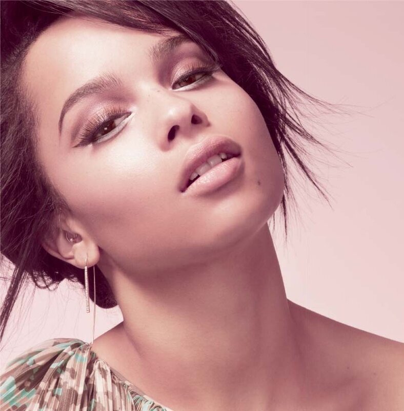 woman with makeup looking up
