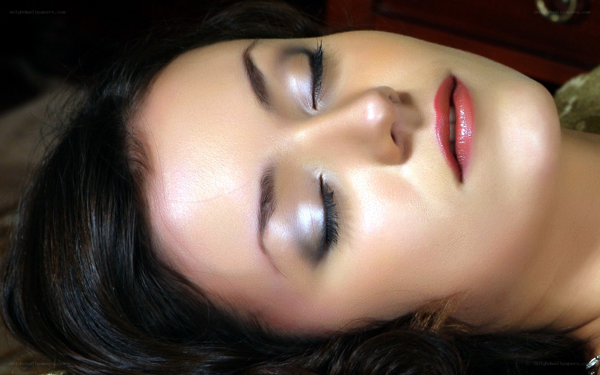 woman with makeup sleeping