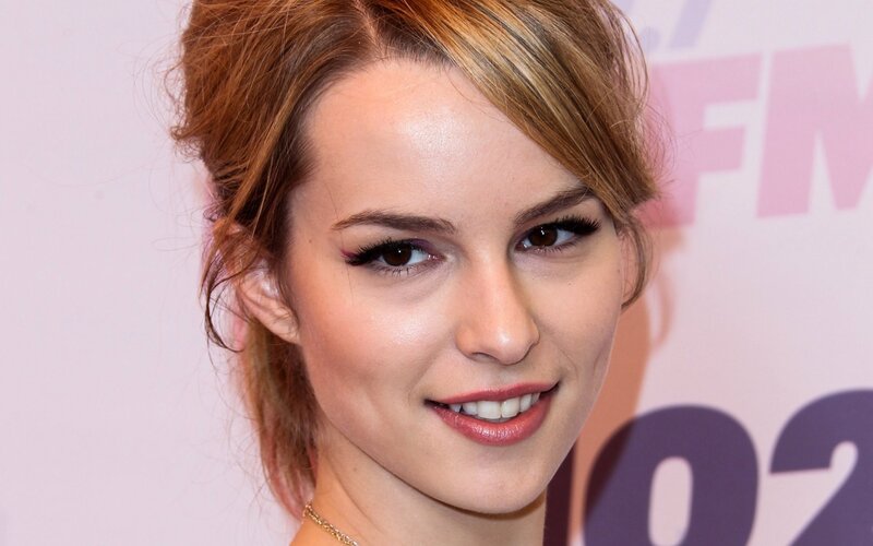 woman with makeup smiling