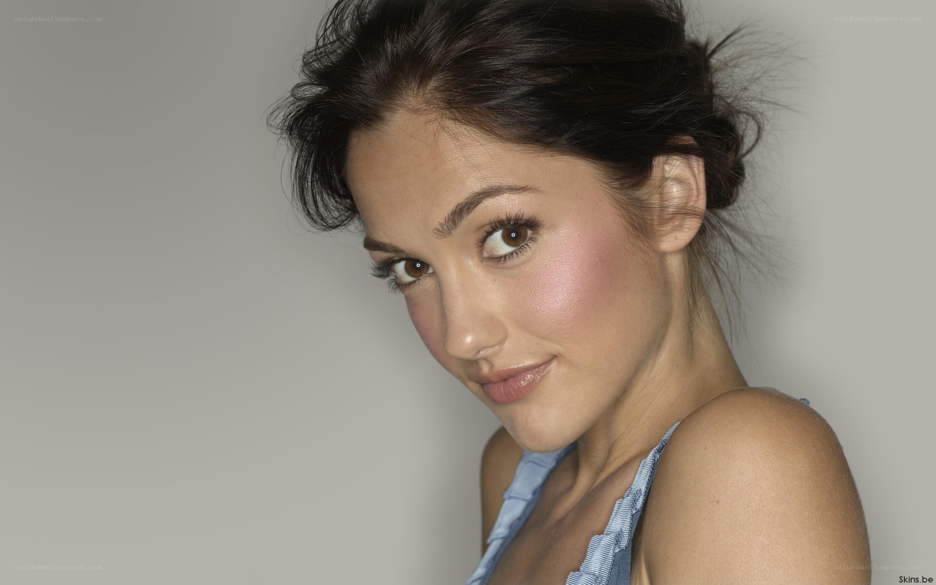 woman with makeup smiling