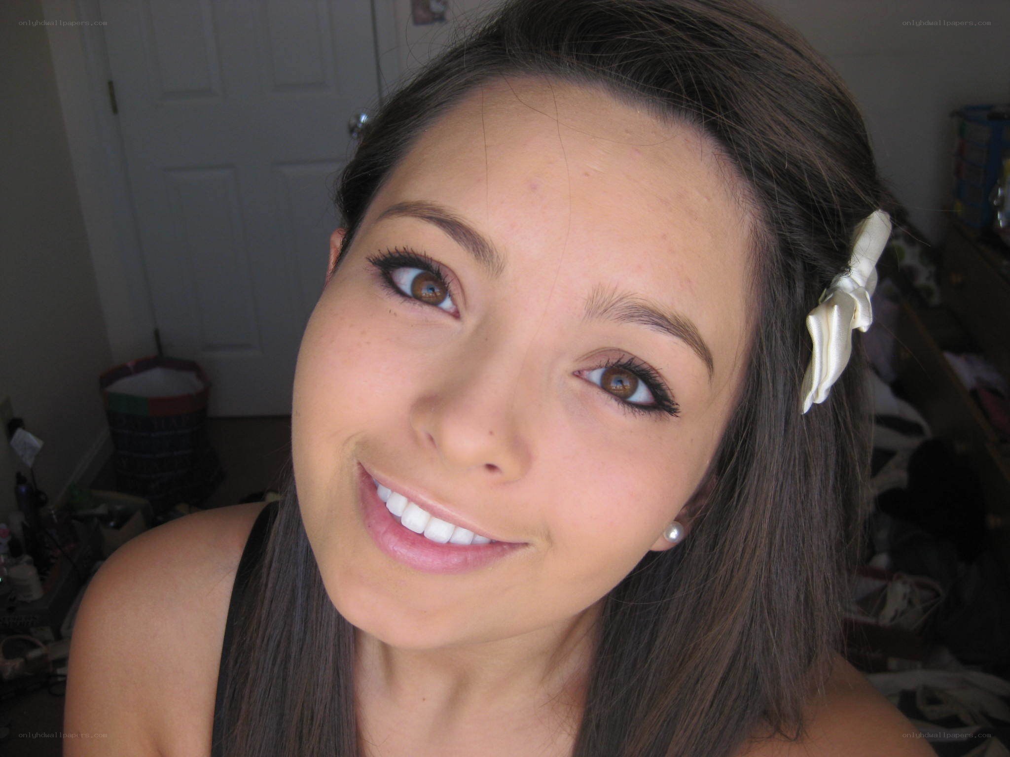 woman with makeup smiling