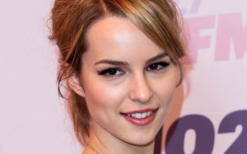 woman with makeup smiling