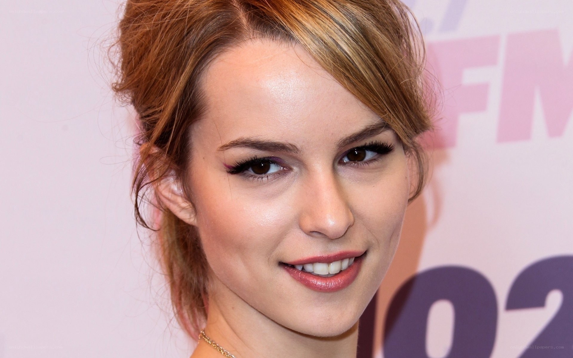 woman with makeup smiling