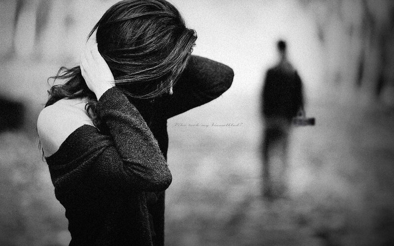 Woman with Man in Background