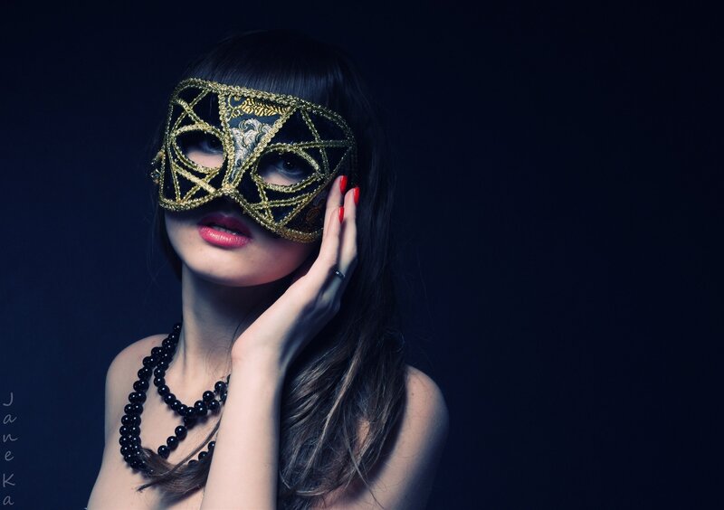 woman with masquerade mask