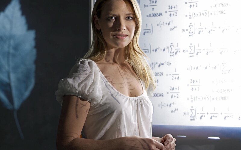 Woman with math equations on her skin