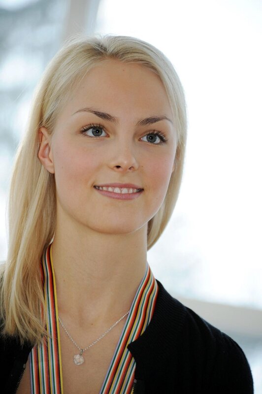 woman with medal around neck