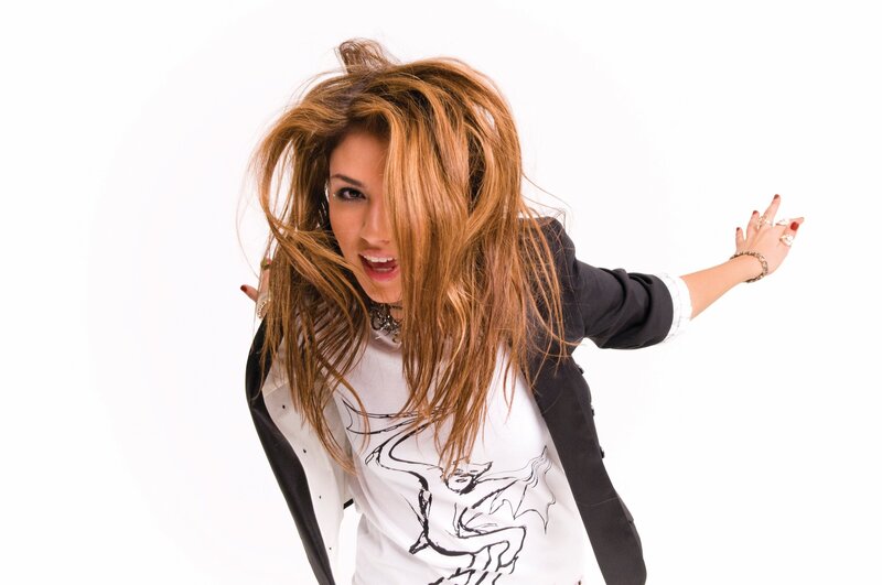 woman with messy hair posing