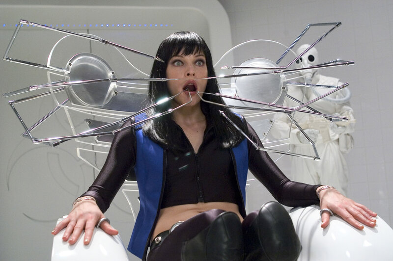 Woman with metal spider device