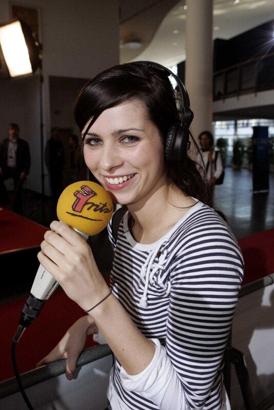woman with microphone and headphones