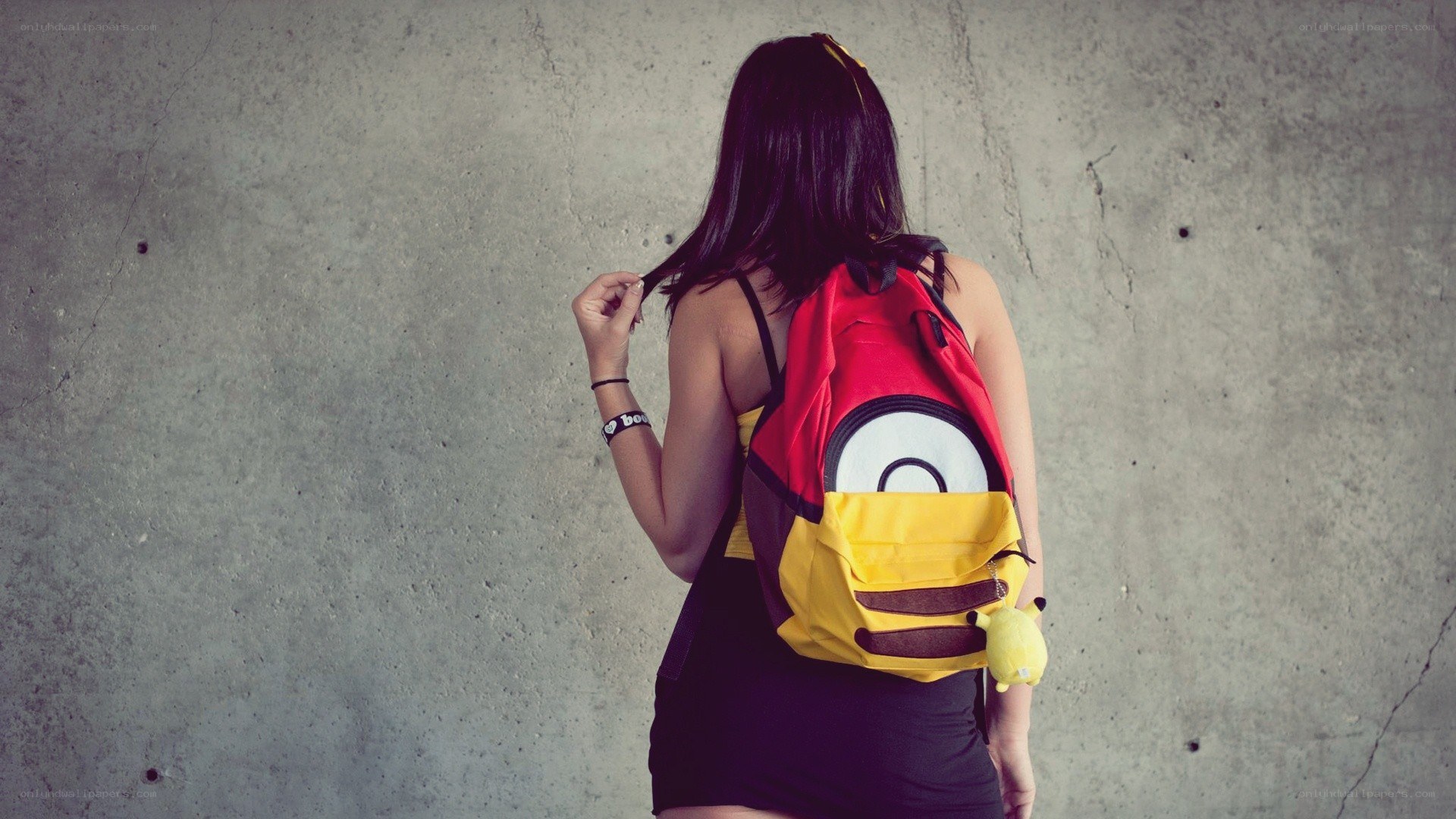 Woman with Minion backpack