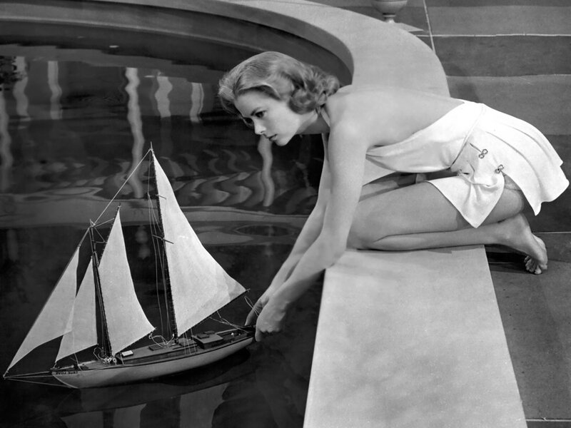 Woman with Model Sailboat — Black