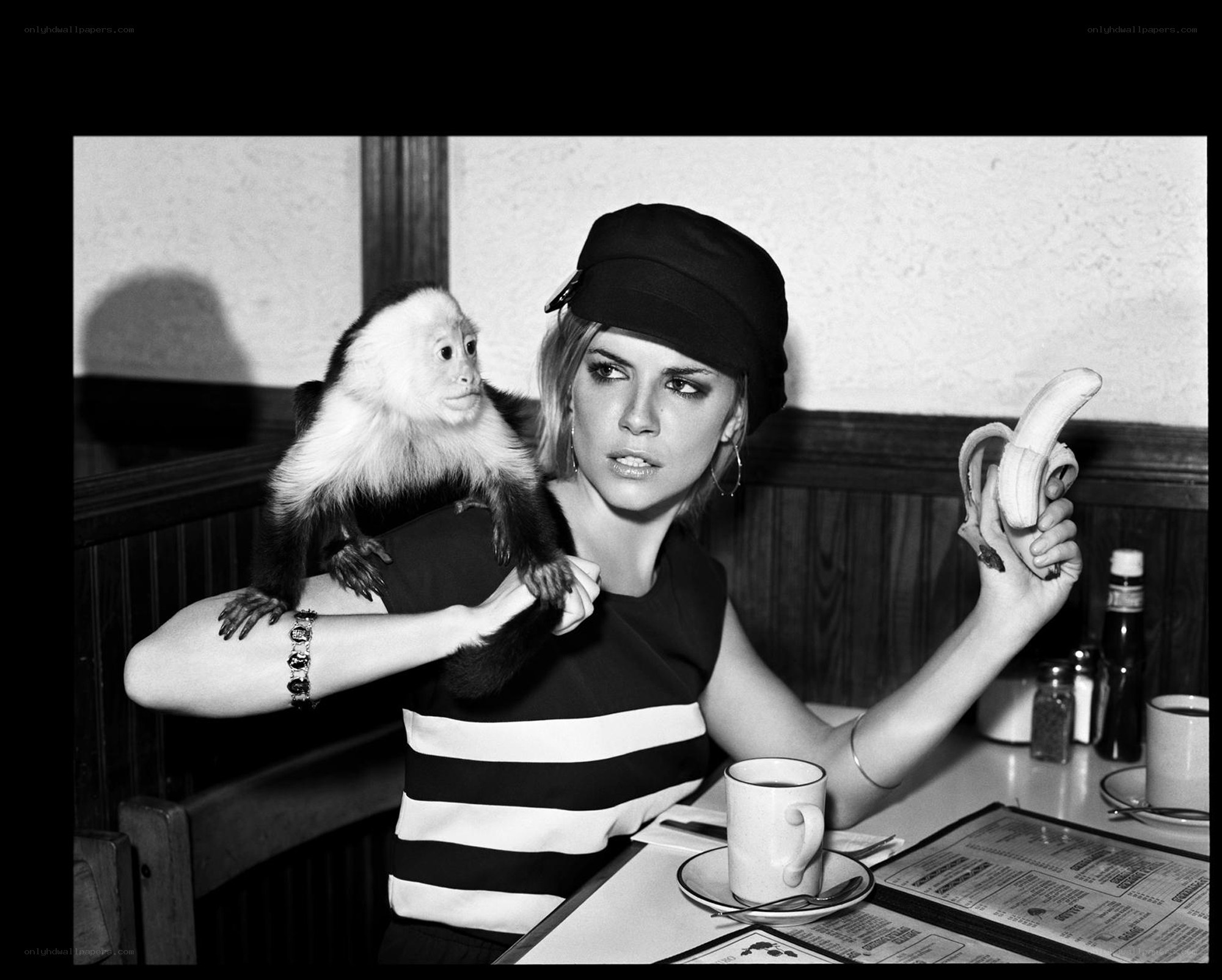 Woman with monkey at diner