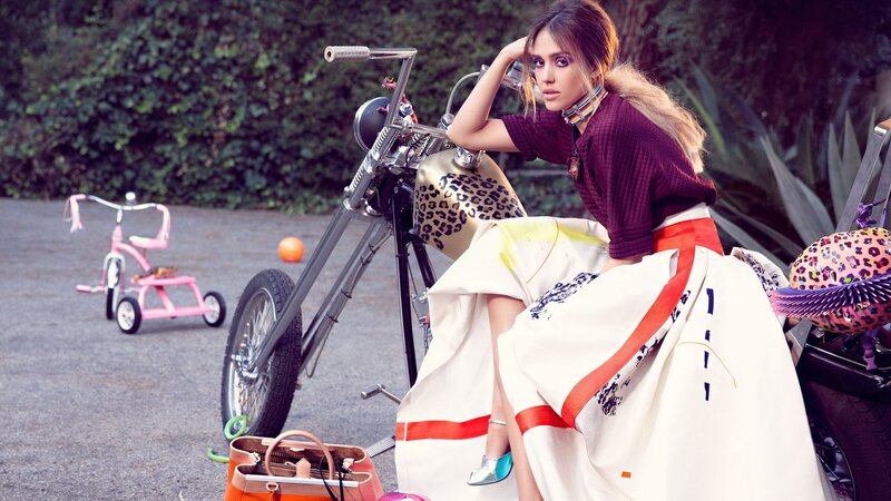 woman with motorcycle and tricycle