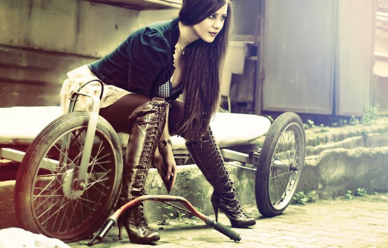 woman with motorcycle parts