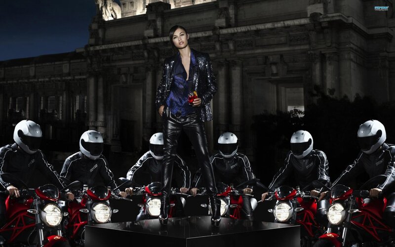 woman with motorcyclists at night