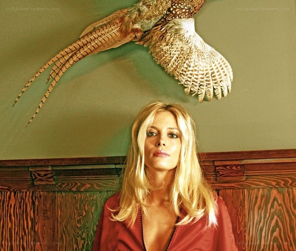 Woman with mounted bird