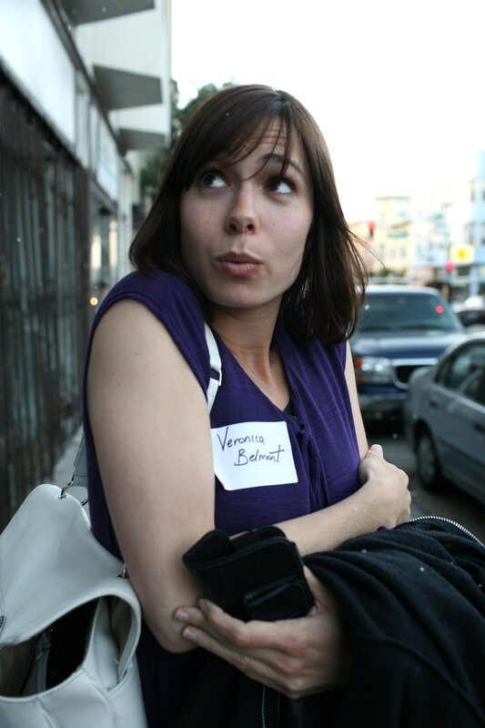 Woman with name tag on street