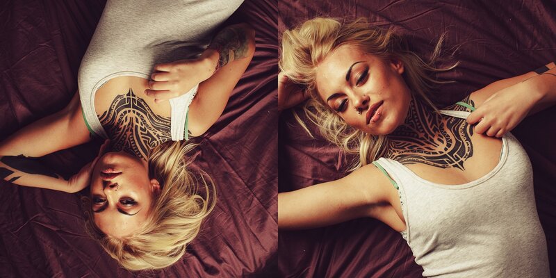 woman with neck tattoo lying down