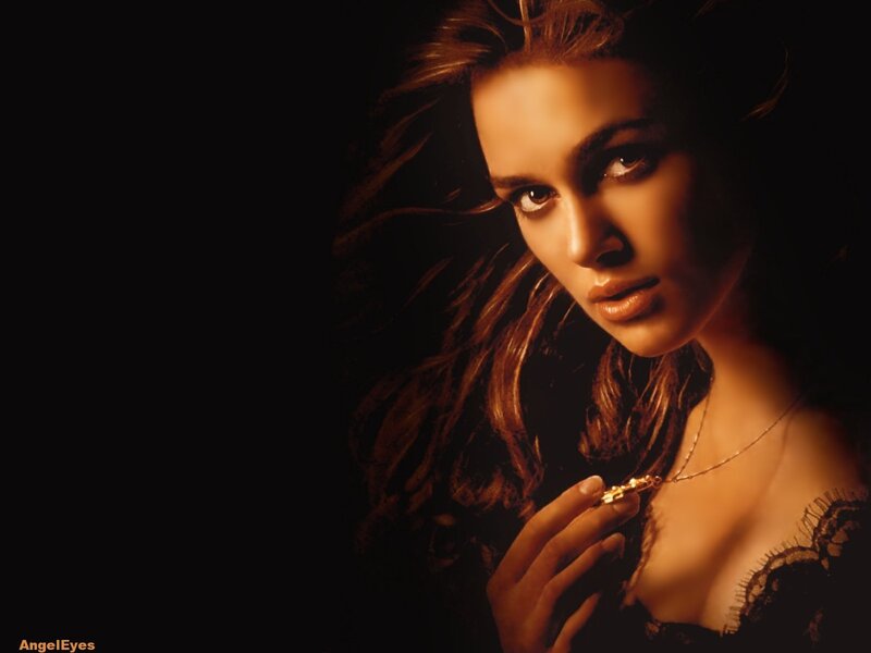 woman with necklace in dark