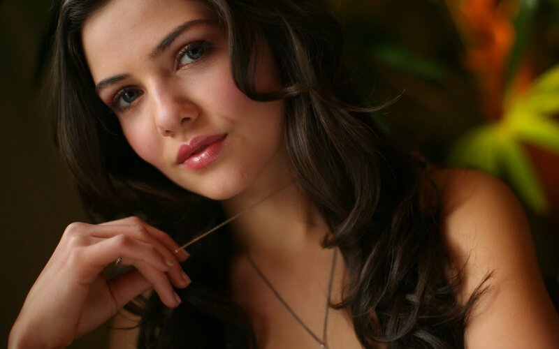woman with necklace in soft light