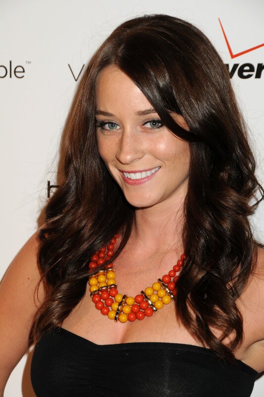 woman with necklace smiling