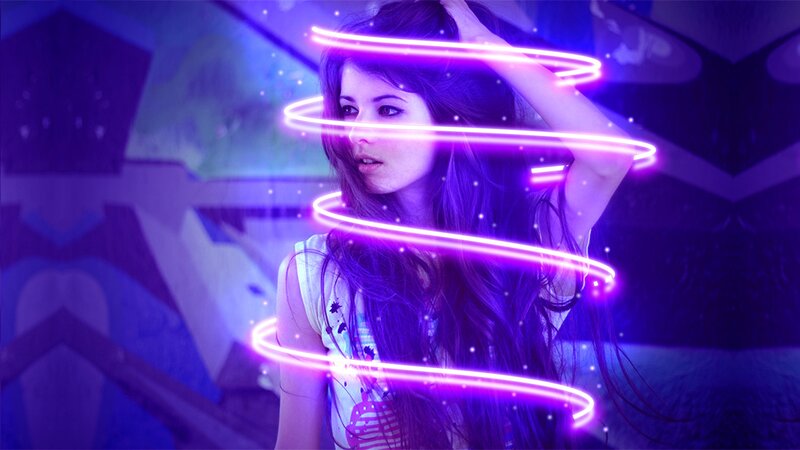 woman with neon light swirls