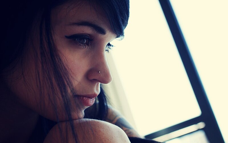 Woman with Nose Piercing — Black, Contemplative