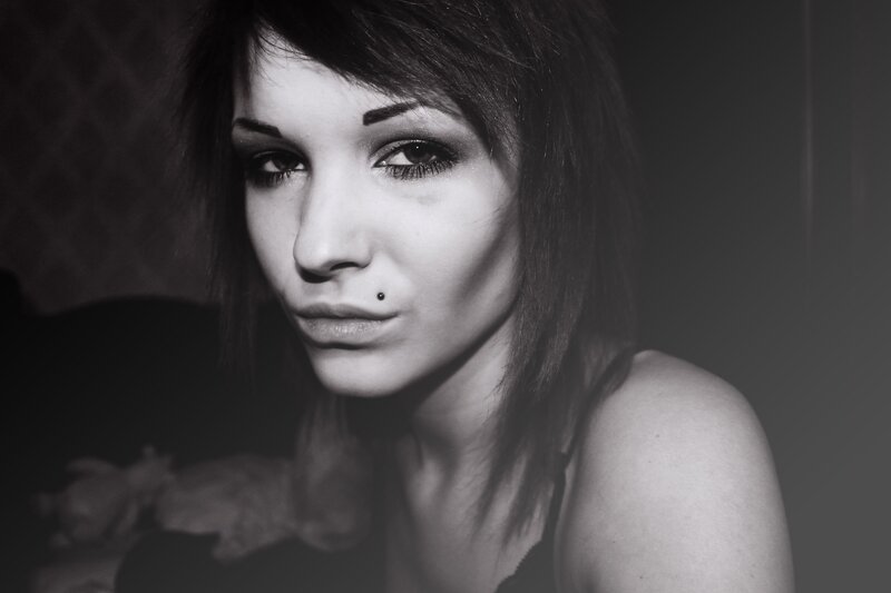 Woman with Nose Piercing — Black, Dramatic, Photograph