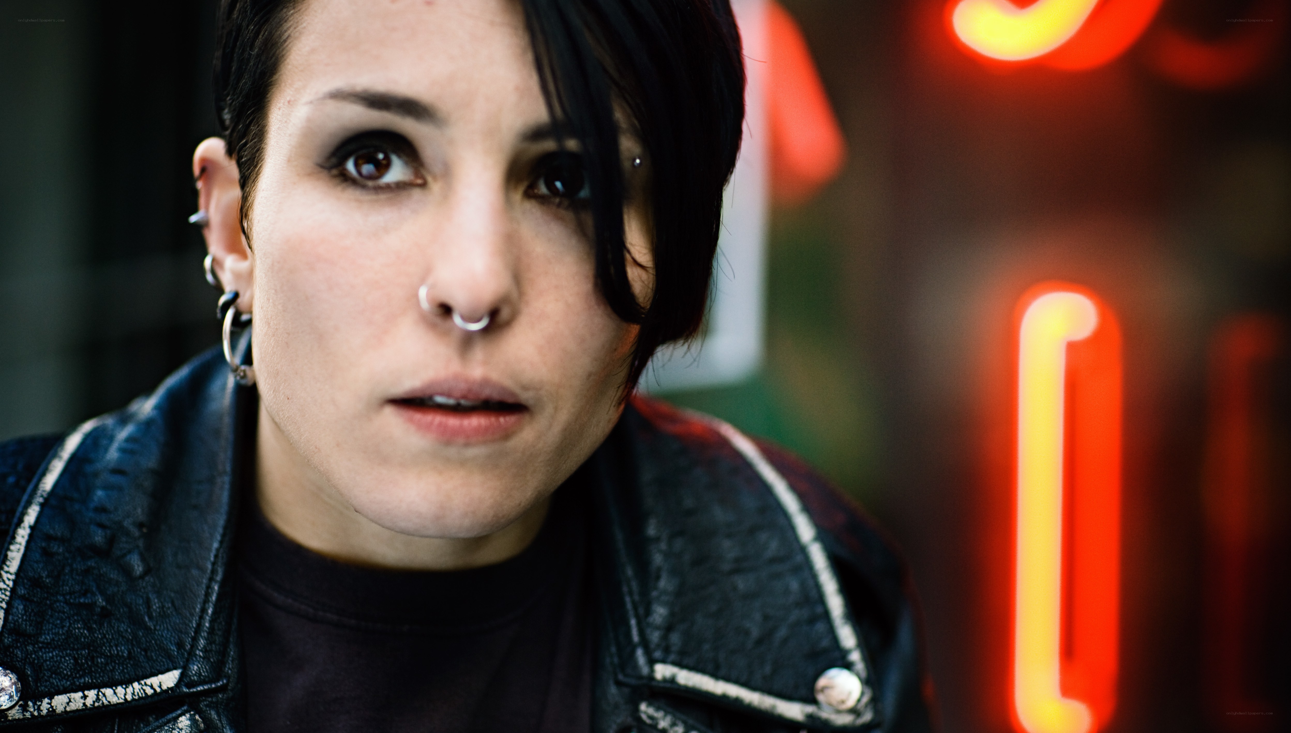 woman with nose ring and leather jacket