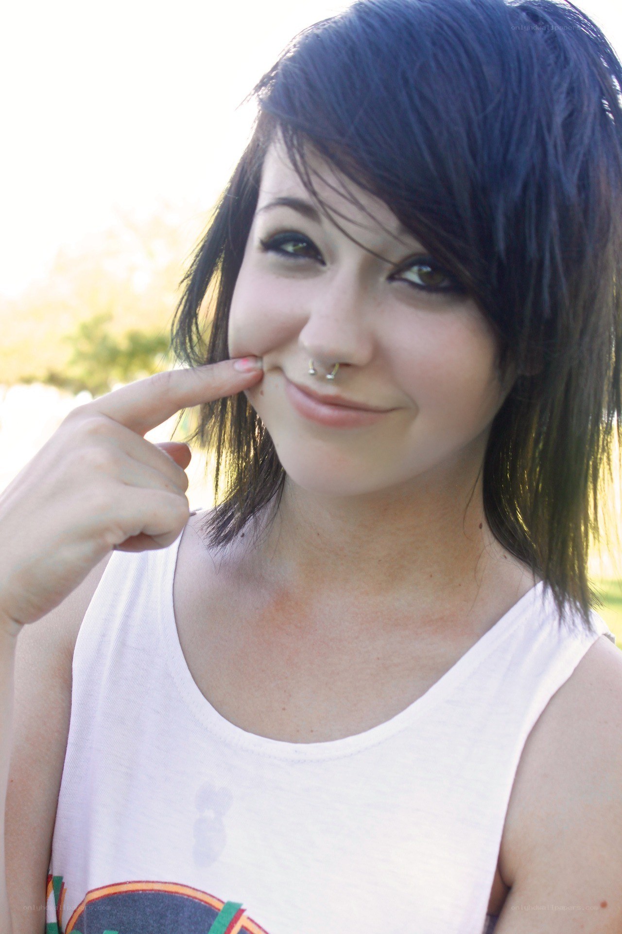 woman with nose ring smiling