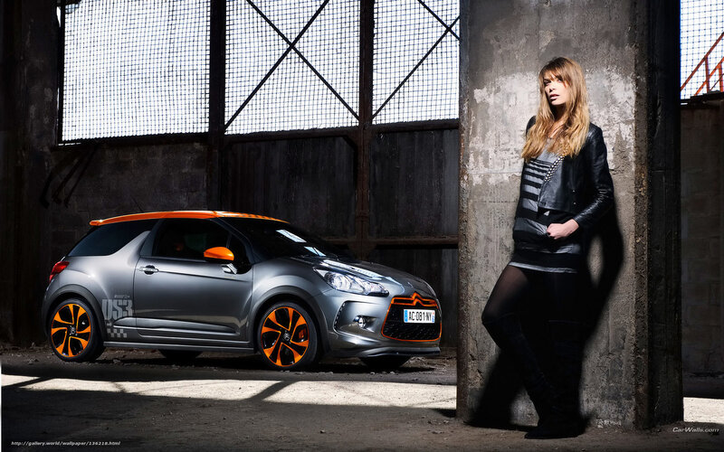 woman with orange-accented car