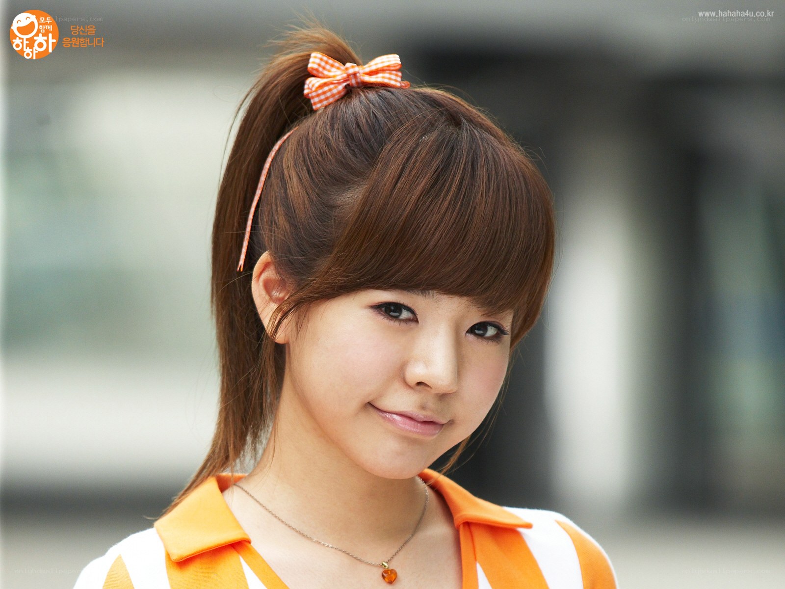woman with orange bow