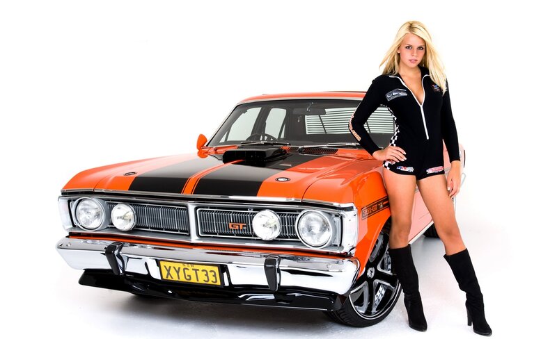 Woman with Orange Car — Confident