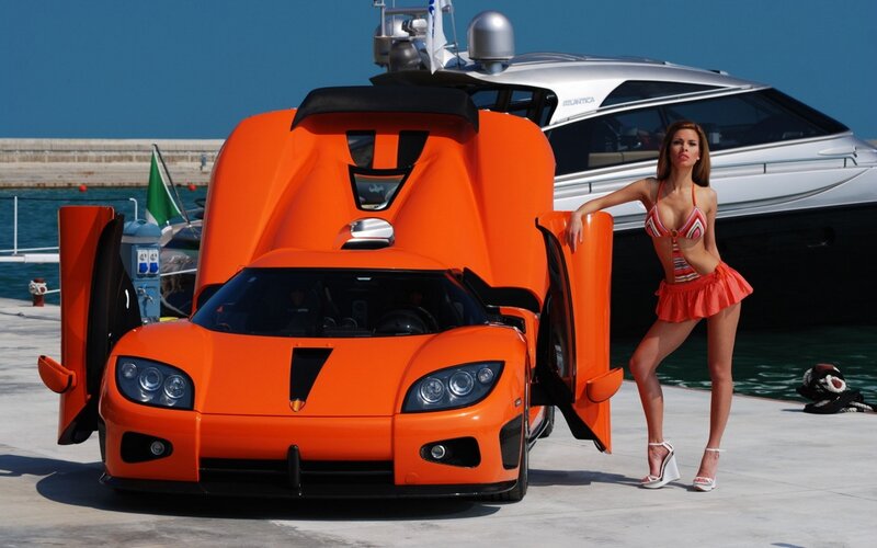 Woman with Orange Car — Dramatic, Afternoon, Photograph, Yacht