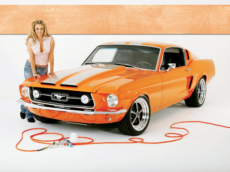 Woman with orange classic car