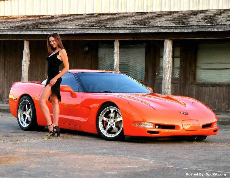 woman with orange corvette