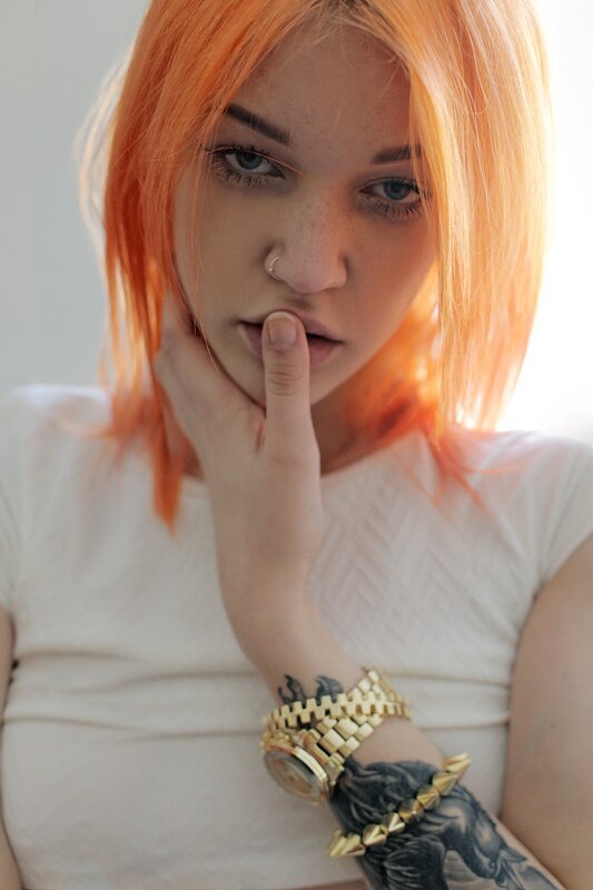 Woman with Orange Hair — Contemplative, Photograph