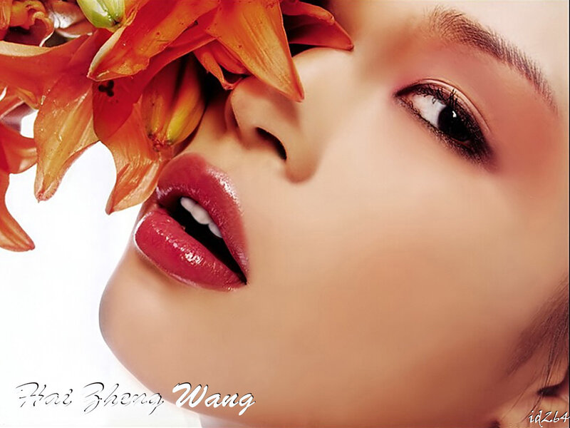 woman with orange lily flower