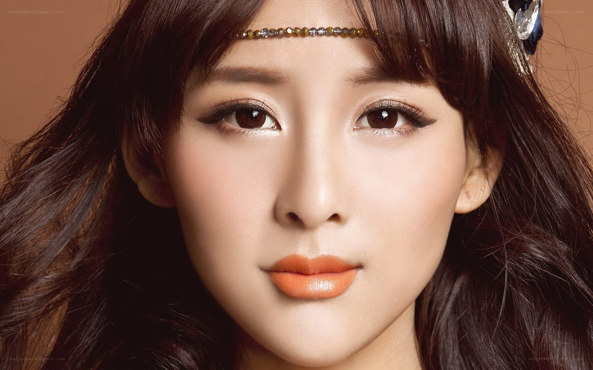 woman with orange lipstick